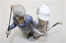 Statue Of Male & Female Golfers by Llardro