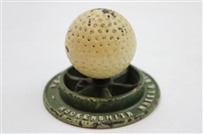 Circular Cast Iron Wheel w/Dimple Golf Ball Paperweight - Hockensmith Wheel & Mine Car Co. - Penn, PA