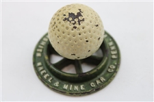 Circular Cast Iron Wheel w/Dimple Golf Ball Paperweight - Hockensmith Wheel & Mine Car Co. - Penn, PA