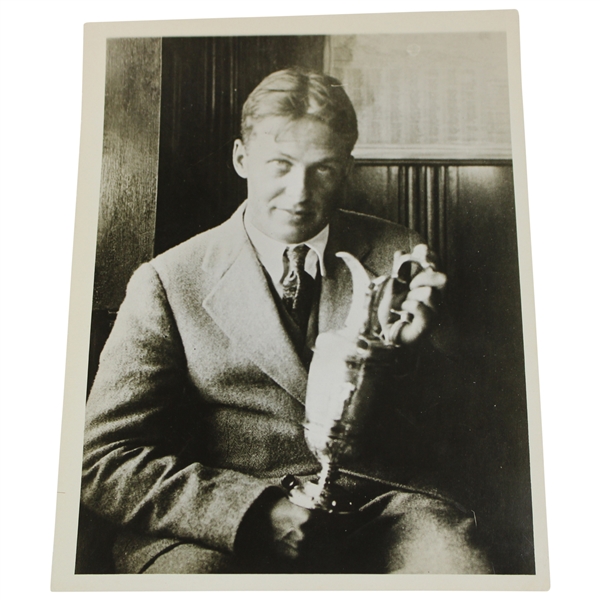 1927 Bobby Jones Winner at the British Open Poses with the Claret Jug Trophy