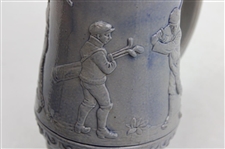 c.1895-1910 German Ges Gesch Gray & Blue Ceramic Beer Stein w/Late 19th Century Golfers In Relief