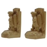 Two (2) Young Caddies Carrying Golf Bags & Clubs Bookends