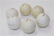 Ray Floyd Signed 11x14 Photo w/Six (6) Ray Floyd Signature Balls & 1969 PGA Badge JSA ALOA