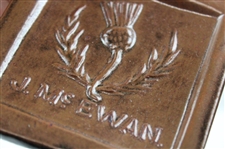 Two (2) J. McEwan Ceramic Coasters