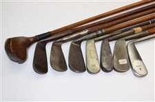 Eight (8) Wood Shaft Clubs 1 Wood L.H. Brassie, Putter Bin Bamboo Shaft, L.H Wilson Diamond Back, 1 Brass Putter Steel Shaft, Jigger Macgregor & Others