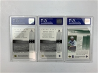 A Collection of Eleven Sergio Garcia and Scottie Scheffler Golf Trading Cards Including Graded and Memorabilia Examples