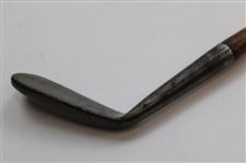 The Spalding Mussel Back Lofting Mashie