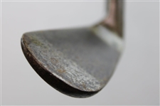 The Spalding Mussel Back Lofting Mashie