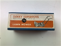 A Group of Vintage Lawn Care Collectibles Including a Dinky Supertoys No. 751 Lawn Mower