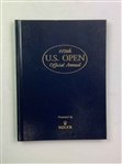A Trio of 2012 112th U.S. Open Official Annual Books Presented by Rolex