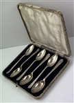 A Set of Six Sterling Silver Golfing Spoons by Walker & Hall