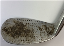 Two Early 20th-Century Hickory-Shafted Golf Clubs Including an Aston Mashie Niblick and an Edgemont Putter