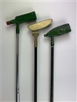 A Trio of Vintage Novelty Promotional Golf Putters Featuring Heinz, J&B, and Canada Dry Branding