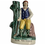 A Staffordshire-Style Polychrome Ceramic Figurine of Young Tom Morris
