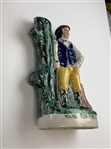A Staffordshire-Style Polychrome Ceramic Figurine of Young Tom Morris