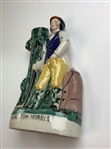 A Staffordshire-Style Polychrome Ceramic Figurine of Young Tom Morris