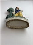 A Staffordshire-Style Polychrome Ceramic Figurine of Young Tom Morris