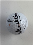 A Trio of Golf Balls Signed by Tiger Woods Caddies Mike Fluff Cowan Steve Williams and Joe LaCava JSA ALOA