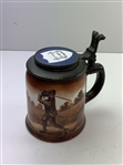 A Pair of Early 1900's O'Hara Dial Co. Collegiate Golf Theme Lidded Steins