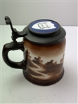 A Pair of Early 1900's O'Hara Dial Co. Collegiate Golf Theme Lidded Steins