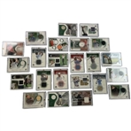 A Collection of Twenty Three Upper Deck Golf Memorabilia Trading Cards Featuring Authentic Fabric Swatches 2001-2003