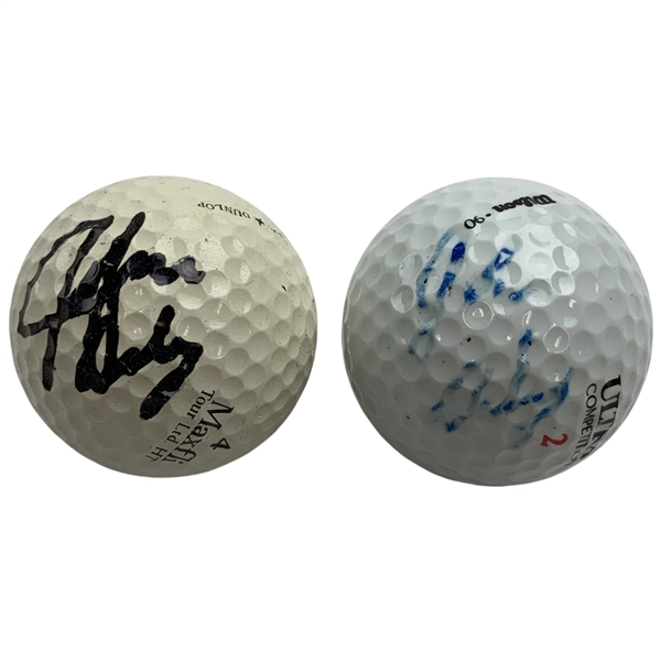 Two John Daly Signed Personal Golf Balls JSA ALOA