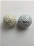 Two John Daly Signed Personal Golf Balls JSA ALOA