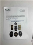 A Collection of Golf Tournament Money Clips and a Central Intelligence Agency Lapel Pin