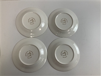 A Set of Four Masters Tournament Porcelain Cocktail Plates