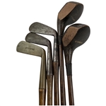 A Set of Three Stevens Hickory Shafted Golf Clubs w/ Two Woods