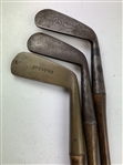 A Set of Three 'Stevens' Hickory Shafted Golf Clubs w/ Two Woods