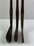 A Set of Three 'Stevens' Hickory Shafted Golf Clubs w/ Two Woods