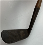 An Assortment of Antique Hickory and Transitional Steel Shafted Golf Irons Including J.H. Taylor and Spalding