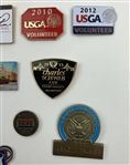 A Collection of 31 Golf Themed Lapel Pins Representing Major Championships and Organizations