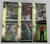 A Collection of 2001 Upper Deck Tiger Woods Tiger s Tales Cards and a Sealed Golf Heroes Playing Card Deck