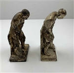 A Pair of Weidlich Brothers Silvered Metal Golfer Bookends, Model 4192