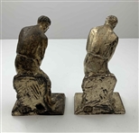 A Pair of Weidlich Brothers Silvered Metal Golfer Bookends, Model 4192