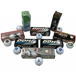 A Collection of Themed Collectible Golf Balls and Original Packaging including Dunlop Titleist Ram and Pinnacle
