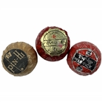 A Trio of Vintage Wrapped Golf Balls Including Bridgestone and Dunlop Warwick