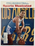 A Collection of Los Angeles Lakers Memorabilia Including Signed Sports Illustrated Magazines and Promotional Items