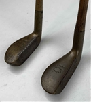 A Pair of Antique Brass Head Putter Golf Clubs with Hickory Shafts