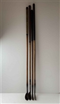 A Set of Four Antique Hickory Shaft Golf Clubs Including Tom Stewart St. Andrews Irons