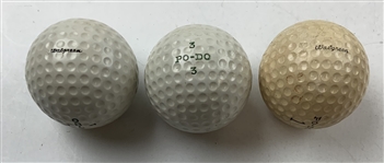 A Group of Three Po-Do Walgreen Golf Balls and Two Boxes of Gold Medal Hard Wood Golf Tees