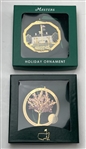 Two Masters Tournament Holiday Ornaments Including 2016 Hole 16 Redbud and 2019 Clubhouse